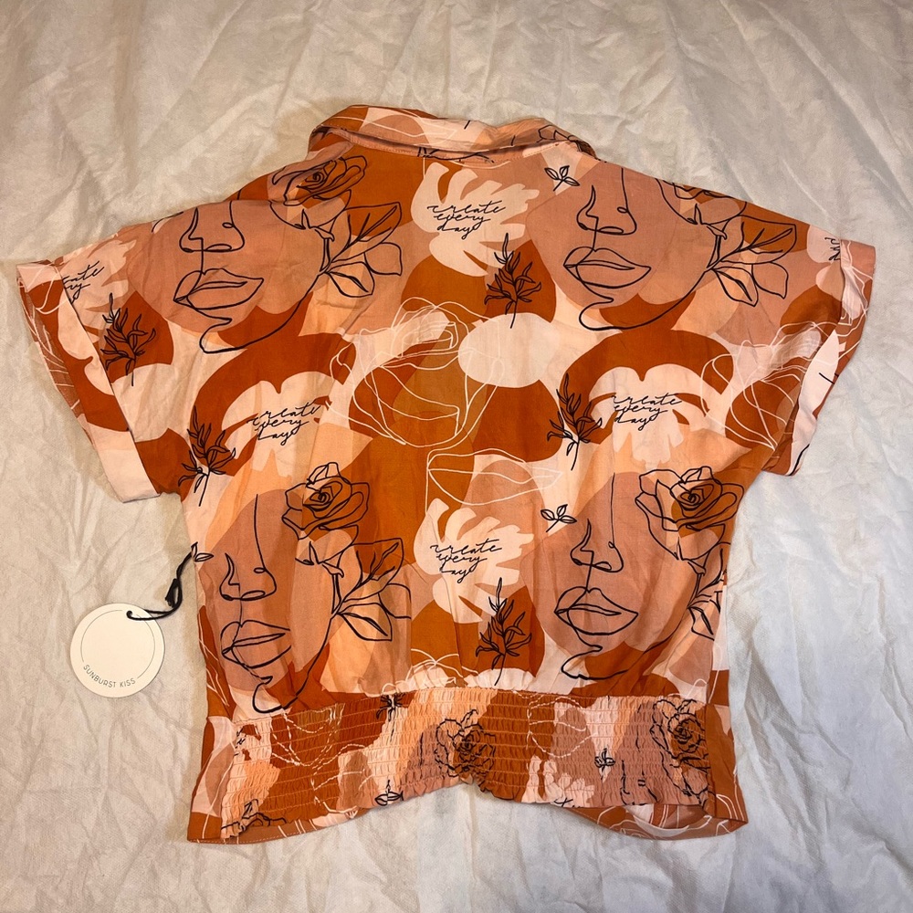 Cute short sleeved button up top